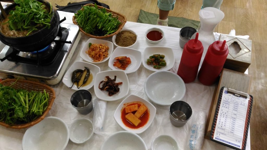 Dishes on the table. On left top we have our main dish cooking.  