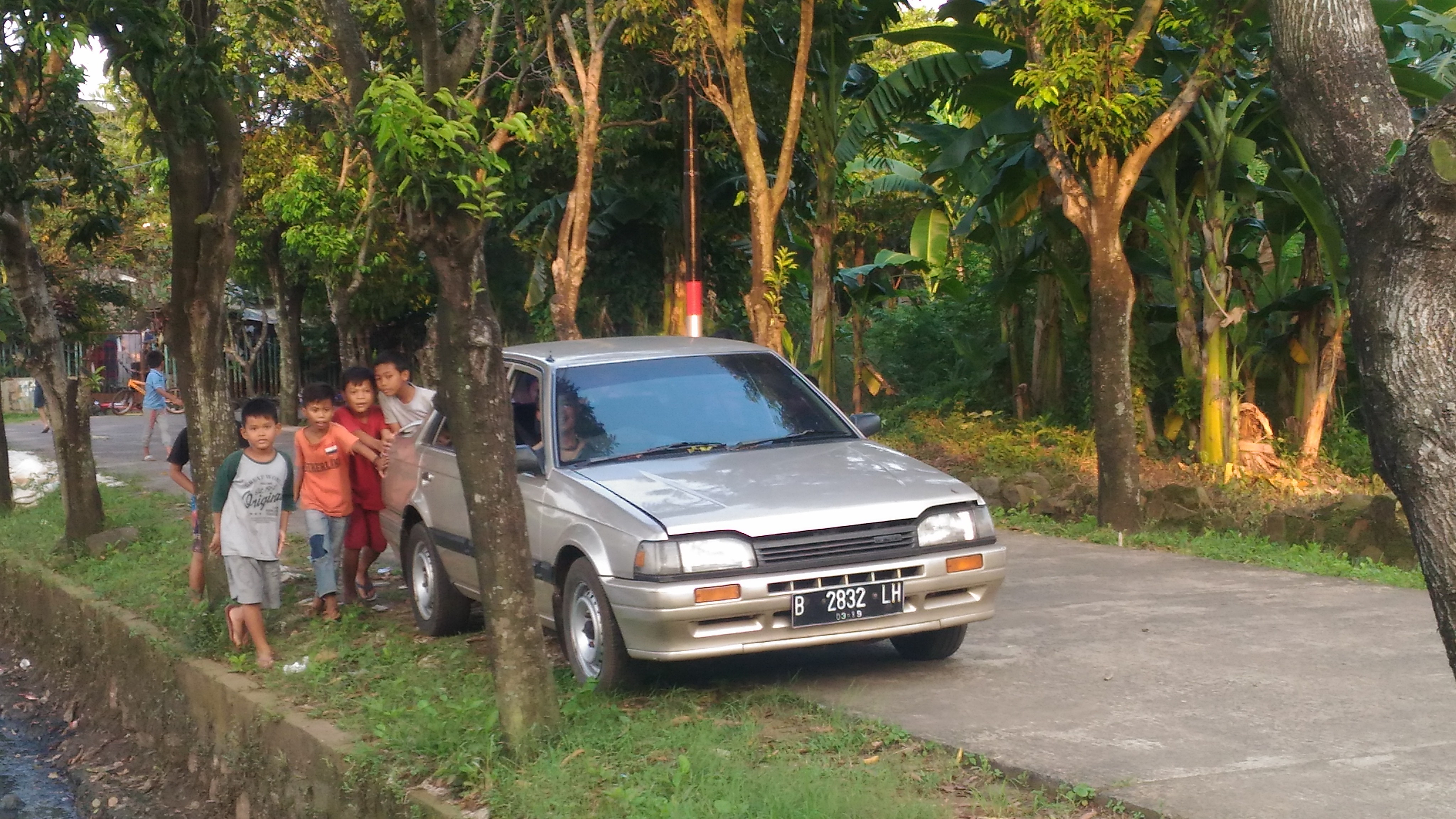 You will see quite a bit of kids on the street, just like India. Here they are pushing a car.