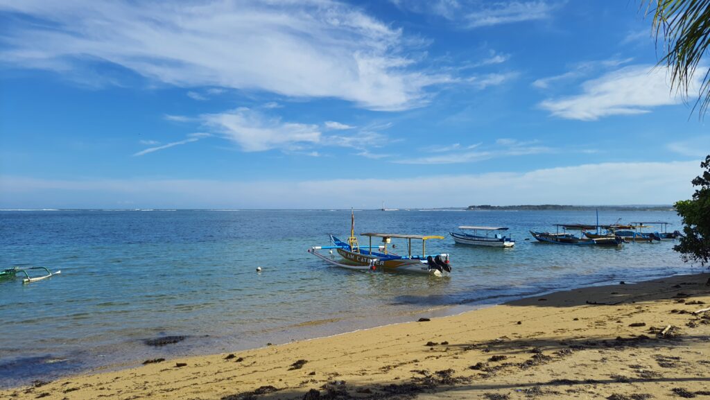 The sky was clear blue and water was very calm.